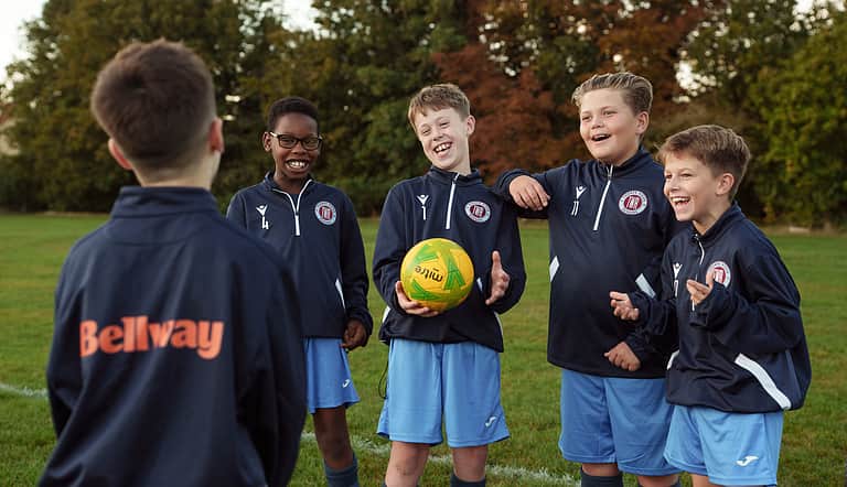 Thorpe Wood Rangers Under 11s football team pictured practising in their new kits sponsored by Bellway.