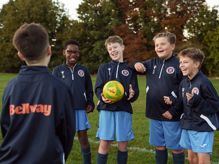 Thorpe Wood Rangers Under 11s football team pictured practising in their new kits sponsored by Bellway.